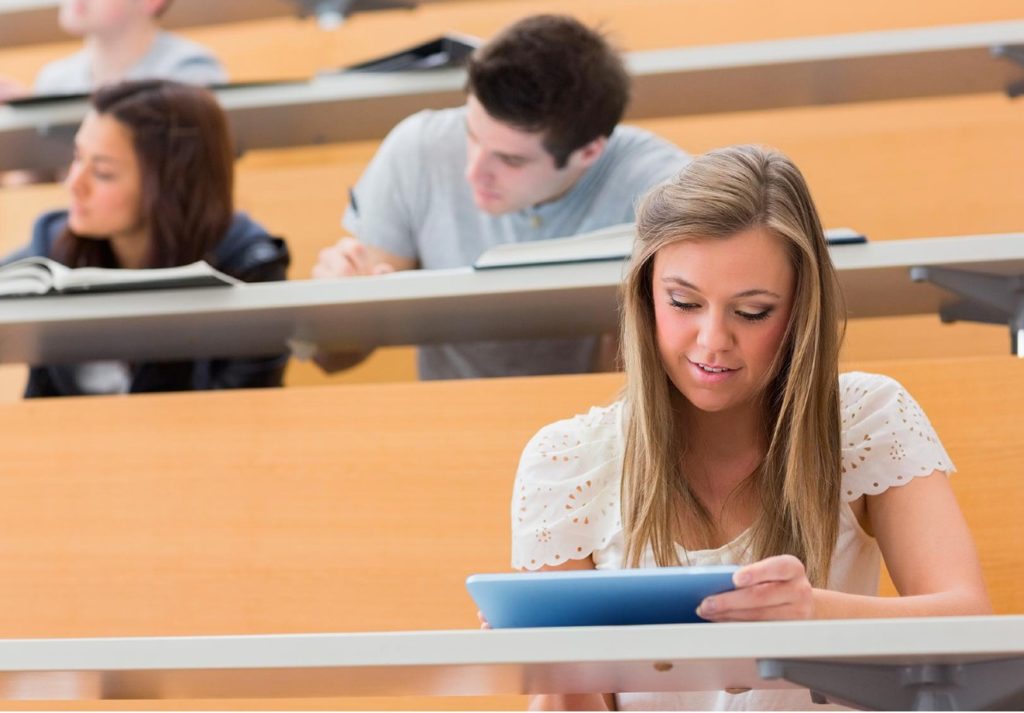 Female student sitting in lecture hall