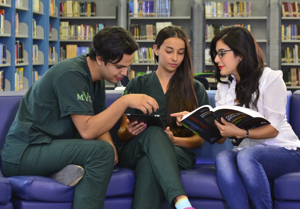 Medical students in a library