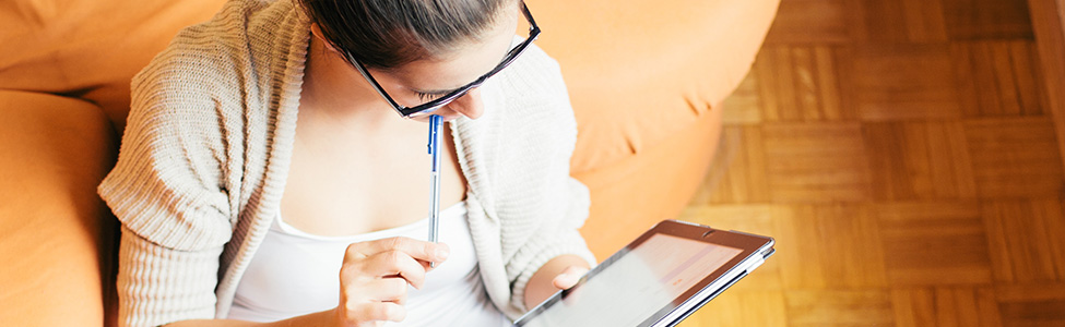 Woman looking at tablet