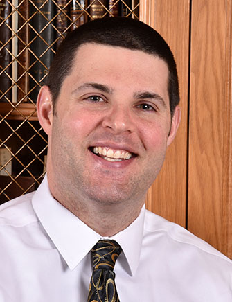 headshot of speaker chris faulkner